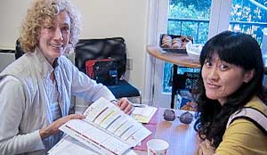 Volunteer sharing information with grad student