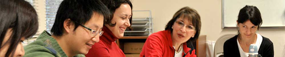 Volunteer instructor and internationals in English class