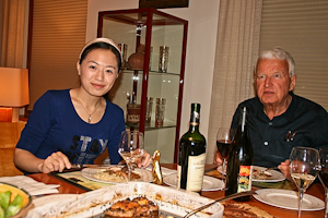 International enjoying a meal at the home of her member hosts