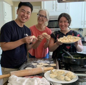 Volunteer hosts two international students in her kitchen